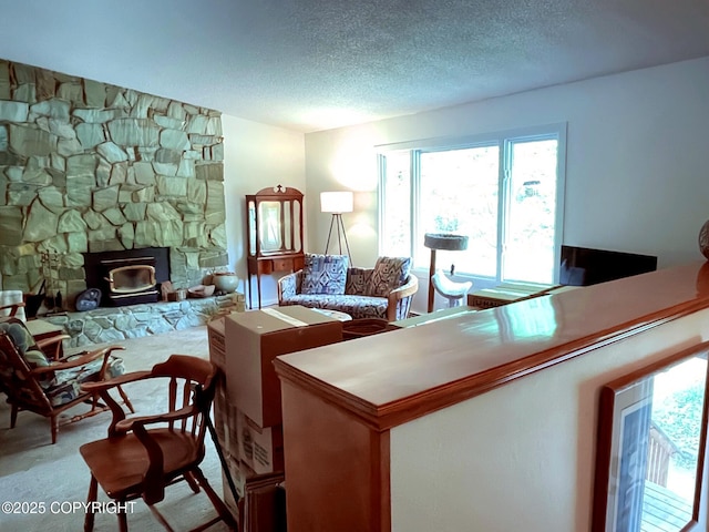 7700 E 32nd Ave, Anchorage, AK 99504 - living room featuring plenty of natural light, a textured ceiling, and carpet floors