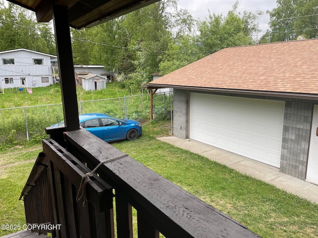 7700 E 32nd Ave, Anchorage, AK 99504 - view of yard featuring an outdoor structure and a detached garage