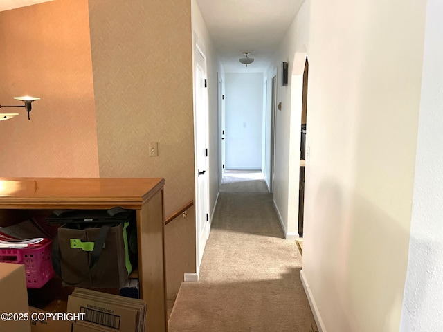 7700 E 32nd Ave, Anchorage, AK 99504 - corridor with carpet flooring and baseboards