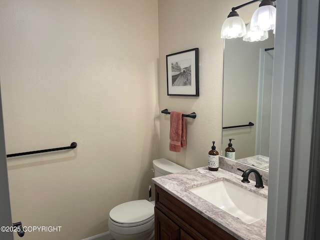 7700 E 32nd Ave, Anchorage, AK 99504 - bathroom featuring vanity and toilet
