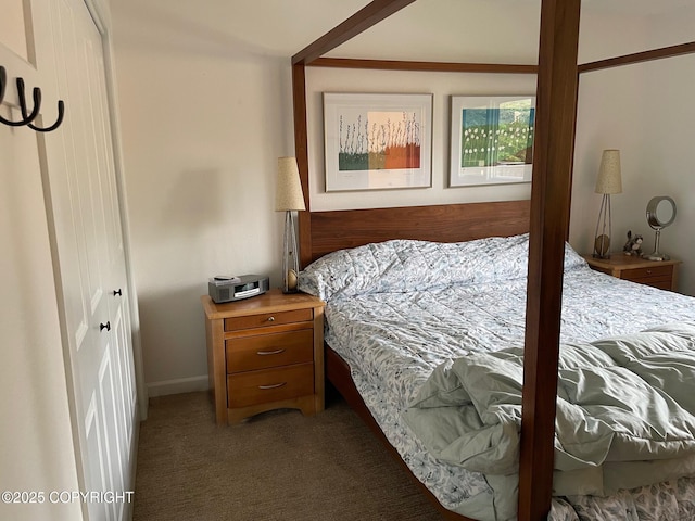 7700 E 32nd Ave, Anchorage, AK 99504 - carpeted bedroom featuring baseboards and a closet