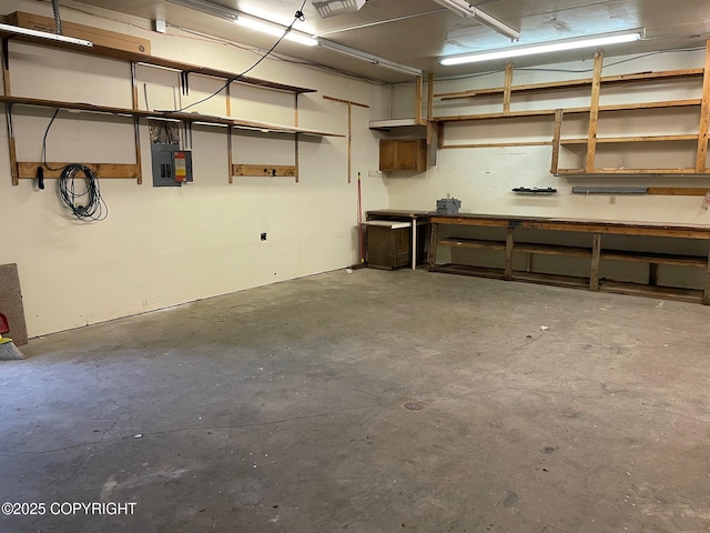 7700 E 32nd Ave, Anchorage, AK 99504 - garage with a workshop area and electric panel