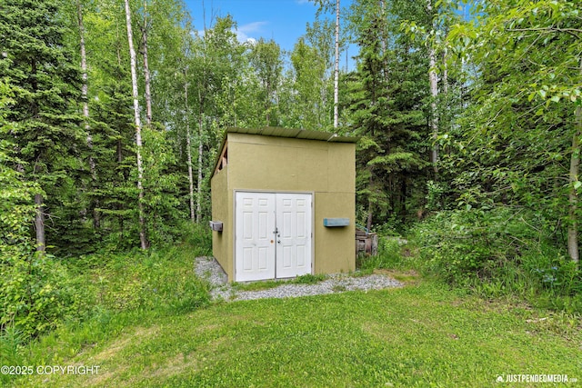 542 S Tender Arctic Dr, Palmer, AK 99645 - view of shed featuring a view of trees