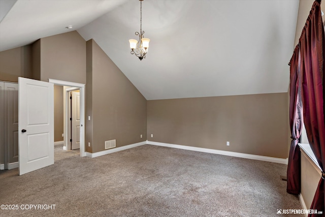 542 S Tender Arctic Dr, Palmer, AK 99645 - additional living space featuring vaulted ceiling, carpet flooring, a chandelier, and baseboards
