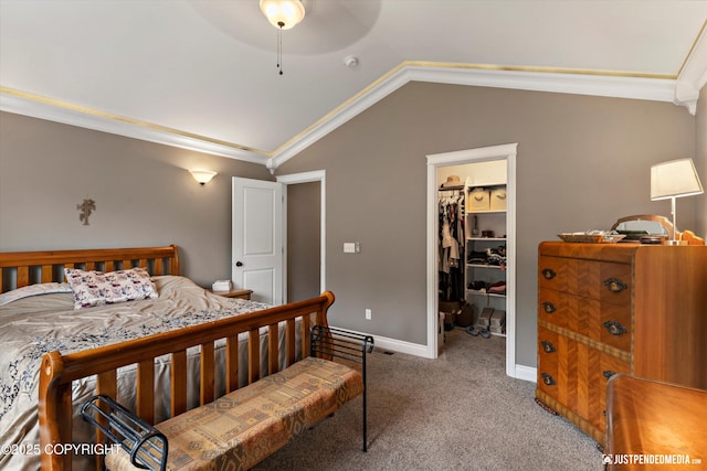 542 S Tender Arctic Dr, Palmer, AK 99645 - carpeted bedroom with vaulted ceiling, a walk in closet, ornamental molding, a closet, and baseboards