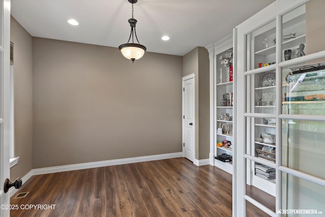 542 S Tender Arctic Dr, Palmer, AK 99645 - unfurnished room featuring dark wood-style flooring, baseboards, and recessed lighting