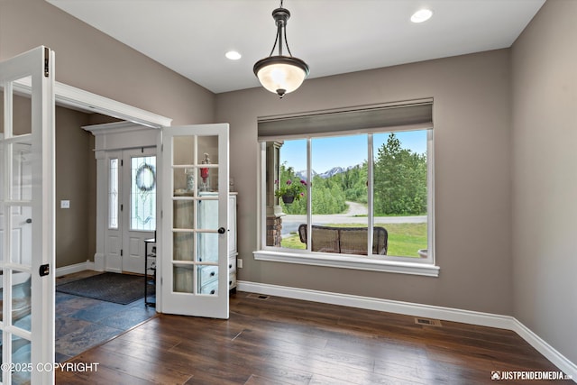 542 S Tender Arctic Dr, Palmer, AK 99645 - spare room featuring french doors, dark wood finished floors, baseboards, and recessed lighting