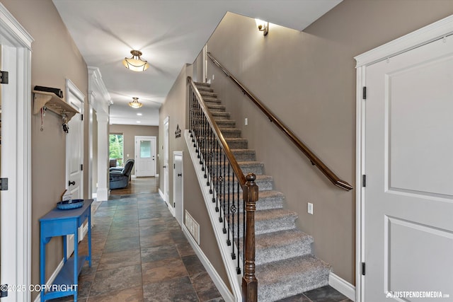 542 S Tender Arctic Dr, Palmer, AK 99645 - stairs with stone finish flooring and baseboards