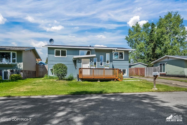2105 W 47th Ave, Anchorage, AK 99517 - raised ranch featuring a wooden deck