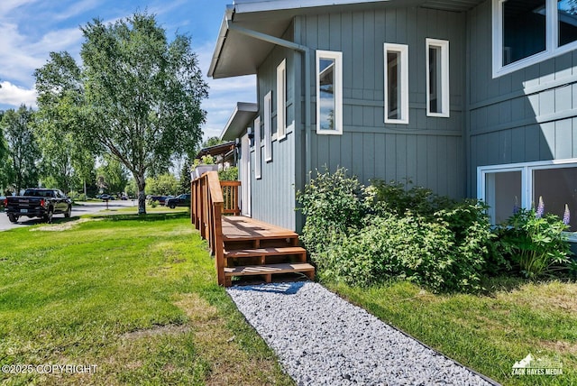 2105 W 47th Ave, Anchorage, AK 99517 - view of side of home featuring a yard