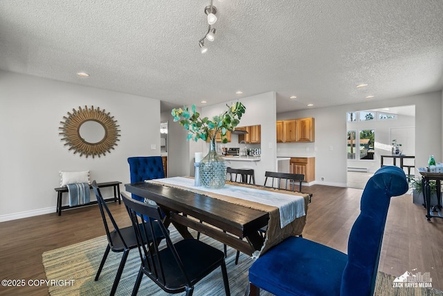 2105 W 47th Ave, Anchorage, AK 99517 - dining room featuring dark wood-type flooring, recessed lighting, a textured ceiling, and baseboard heating