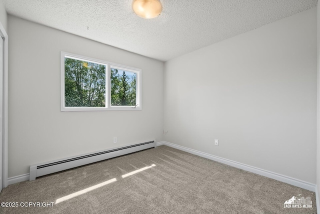2105 W 47th Ave, Anchorage, AK 99517 - empty room with baseboard heating, carpet flooring, and a textured ceiling