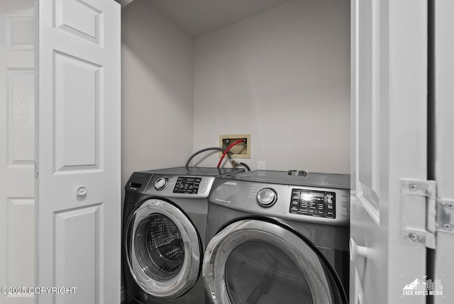 2105 W 47th Ave, Anchorage, AK 99517 - laundry room featuring washer and clothes dryer