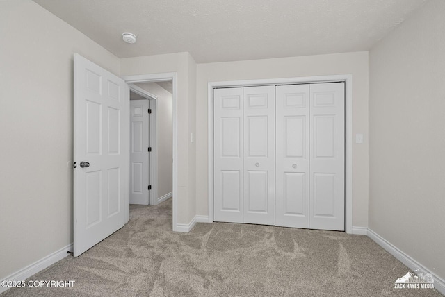 2105 W 47th Ave, Anchorage, AK 99517 - unfurnished bedroom with carpet floors and a closet