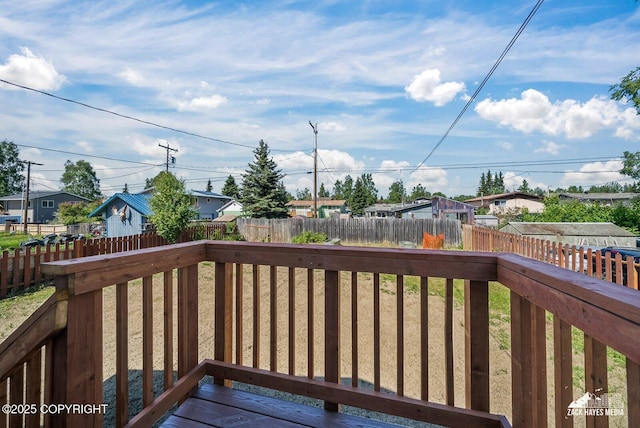 2105 W 47th Ave, Anchorage, AK 99517 - wooden deck featuring a residential view and a fenced backyard