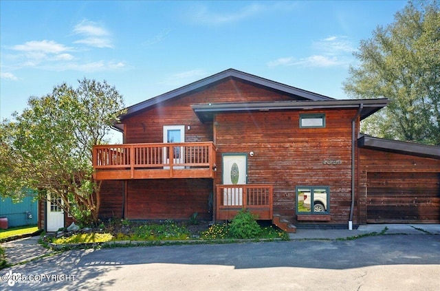 4085 Calhoun St, Homer, AK 99603 - view of front facade featuring a balcony