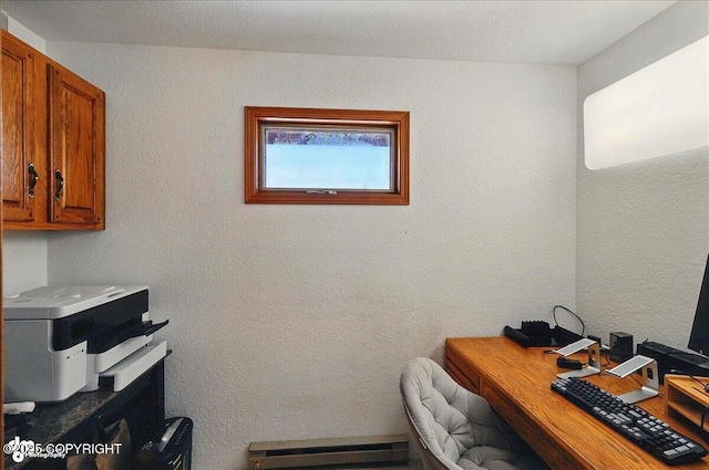 4085 Calhoun St, Homer, AK 99603 - home office with a baseboard radiator and a textured wall