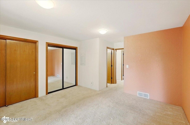 4085 Calhoun St, Homer, AK 99603 - unfurnished bedroom with carpet and multiple closets