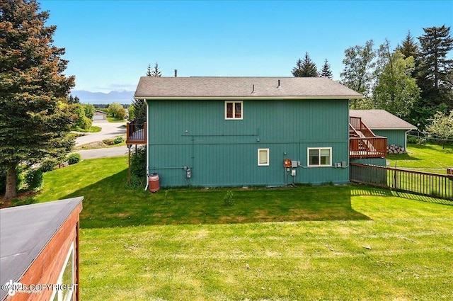 4085 Calhoun St, Homer, AK 99603 - back of property with a wooden deck