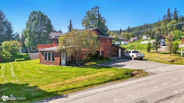 4085 Calhoun St, Homer, AK 99603 - view of front of home featuring driveway and a front yard