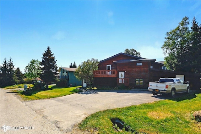 4085 Calhoun St, Homer, AK 99603 - view of front of home featuring driveway and a front yard