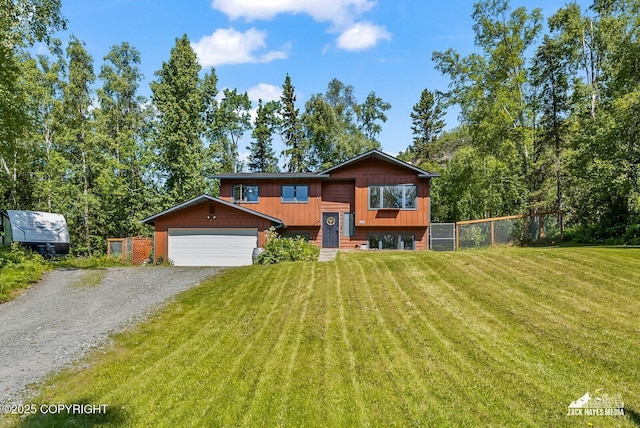 20213 David Ave, Eagle River, AK 99577 - raised ranch featuring an attached garage and gravel driveway