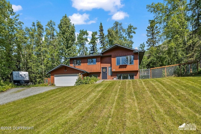 20213 David Ave, Eagle River, AK 99577 - raised ranch featuring gravel driveway and an attached garage