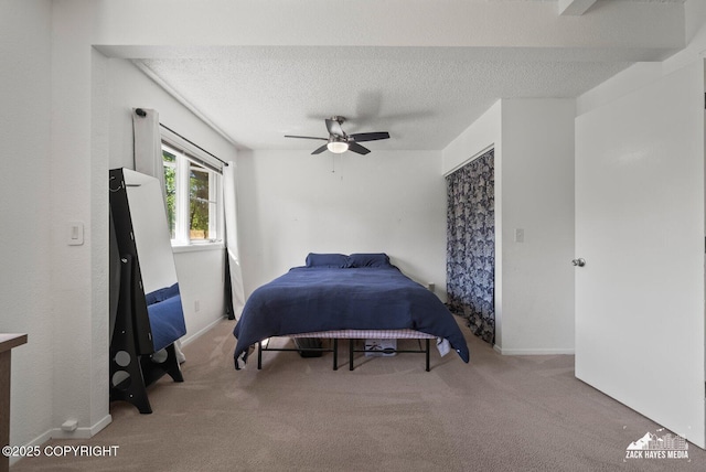20213 David Ave, Eagle River, AK 99577 - bedroom featuring carpet, a textured ceiling, and a ceiling fan