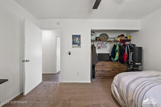20213 David Ave, Eagle River, AK 99577 - carpeted bedroom featuring a textured ceiling and ceiling fan