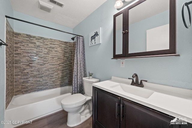 20213 David Ave, Eagle River, AK 99577 - full bath with shower / bath combo, vanity, and wood finished floors