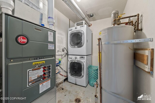 20213 David Ave, Eagle River, AK 99577 - laundry room featuring stacked washer / drying machine, strapped water heater, and heating unit
