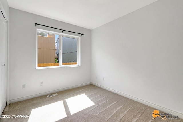 2922 Summer Sun Ct # 154, Anchorage, AK 99507 - spare room with carpet flooring and baseboards