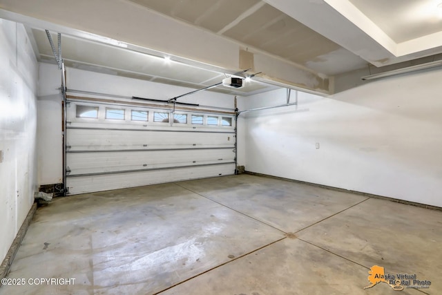 2922 Summer Sun Ct # 154, Anchorage, AK 99507 - garage featuring a garage door opener