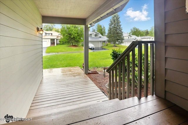12830 Mission Cir, Anchorage, AK 99516 - wooden deck with a yard and a residential view