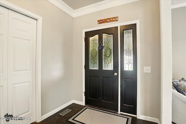 12830 Mission Cir, Anchorage, AK 99516 - entryway with crown molding, baseboards, and dark wood-style floors