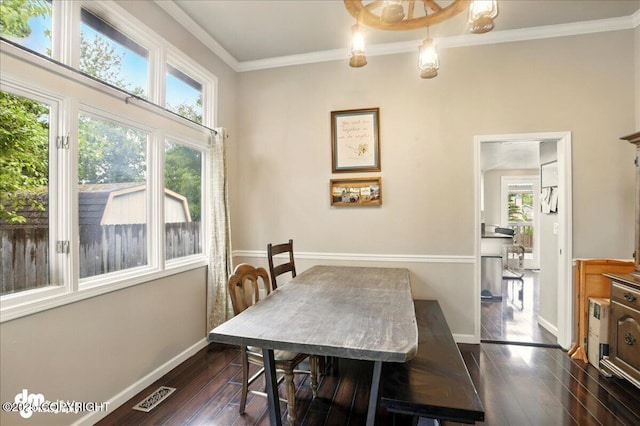 12830 Mission Cir, Anchorage, AK 99516 - dining area with baseboards, dark wood-style floors, and ornamental molding