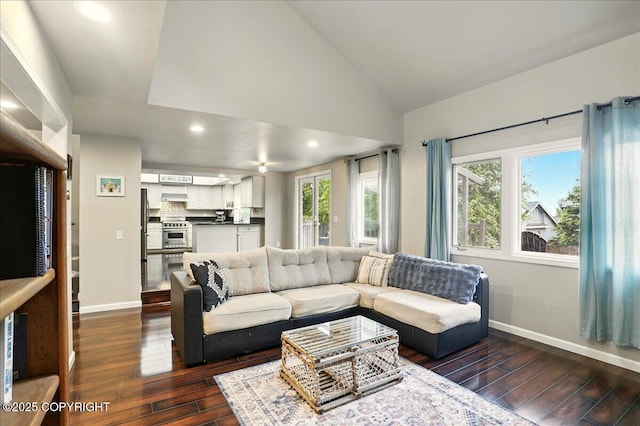 12830 Mission Cir, Anchorage, AK 99516 - living room with dark wood-type flooring, baseboards, recessed lighting, healthy amount of natural light, and lofted ceiling