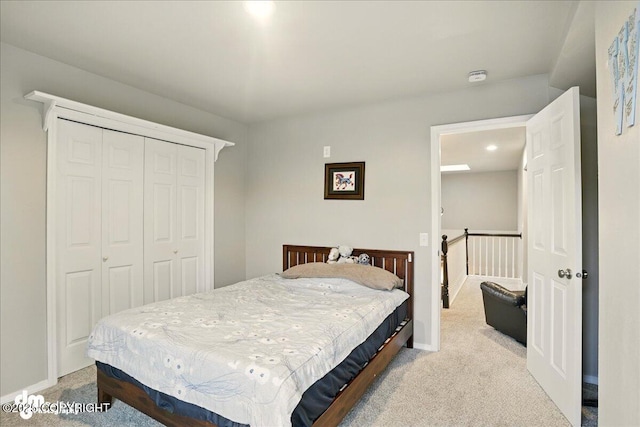 12830 Mission Cir, Anchorage, AK 99516 - carpeted bedroom featuring a closet and baseboards