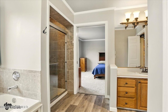 12830 Mission Cir, Anchorage, AK 99516 - bathroom featuring vanity, a shower stall, ensuite bathroom, ornamental molding, and wood finished floors