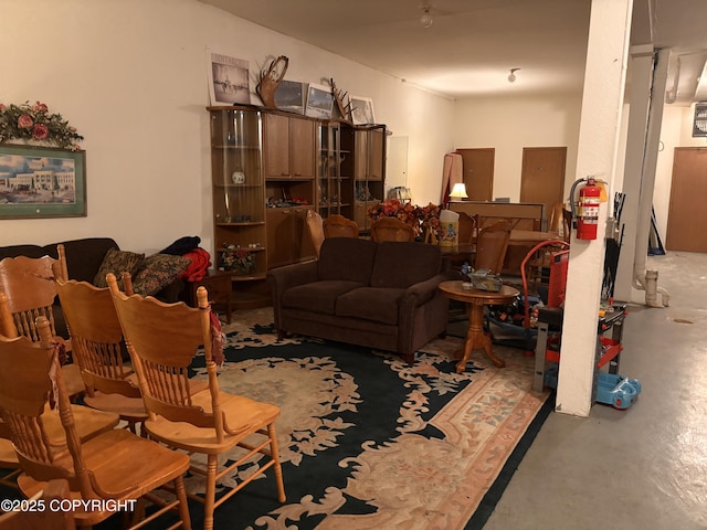 810 E 79th Ave, Anchorage, AK 99518 - living area with concrete flooring