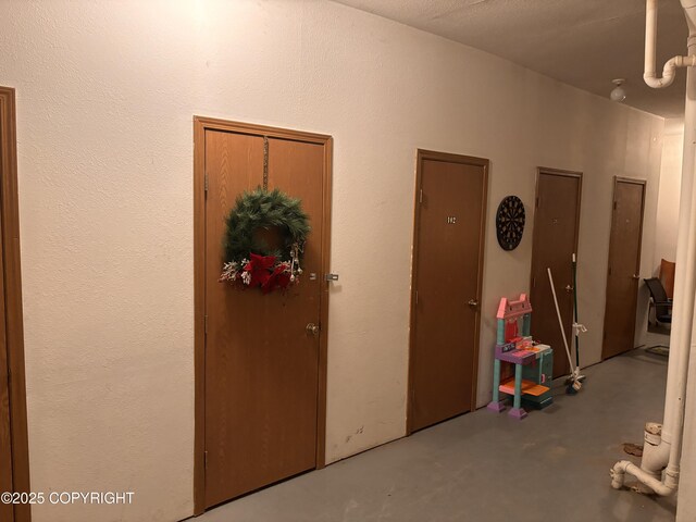 810 E 79th Ave, Anchorage, AK 99518 - hall with concrete flooring