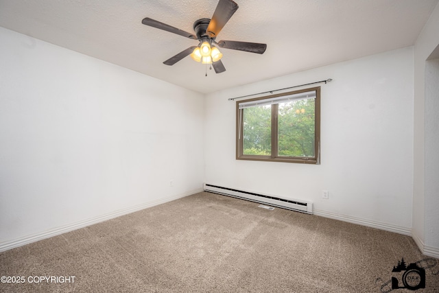 5275 E Birch Dr, Wasilla, AK 99654 - carpeted empty room with a baseboard radiator and ceiling fan
