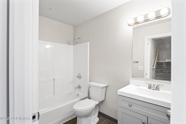1100 Fred Cir, Anchorage, AK 99515 - full bathroom with vanity, toilet, shower / washtub combination, and wood finished floors