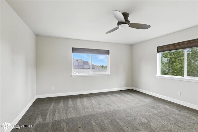8683 Estates Cir, Anchorage, AK 99507 - carpeted empty room featuring plenty of natural light and ceiling fan