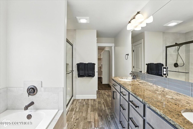 8683 Estates Cir, Anchorage, AK 99507 - full bath featuring a stall shower, double vanity, and a garden tub