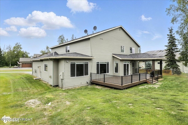 8683 Estates Cir, Anchorage, AK 99507 - back of property featuring a deck and a lawn