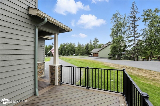 8683 Estates Cir, Anchorage, AK 99507 - wooden porch with a yard
