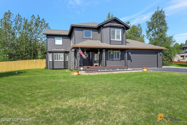2548 S Gallop Cir, Wasilla, AK 99654 - traditional-style house featuring driveway, an attached garage, and a porch