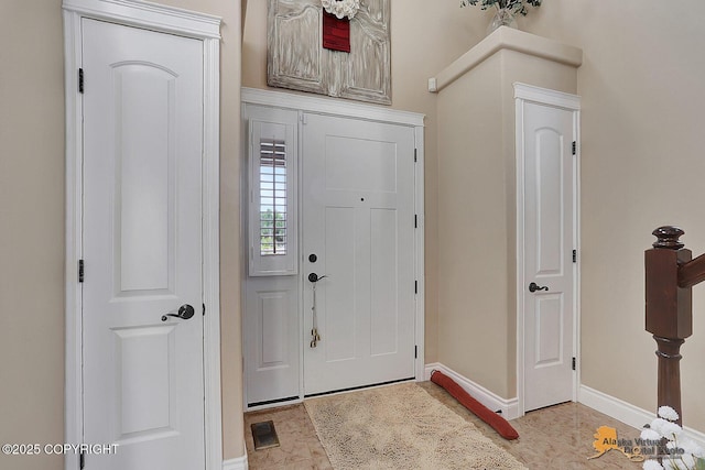 2548 S Gallop Cir, Wasilla, AK 99654 - entryway featuring baseboards