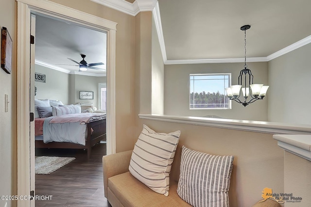 2548 S Gallop Cir, Wasilla, AK 99654 - bedroom with crown molding, multiple windows, wood finished floors, and a chandelier